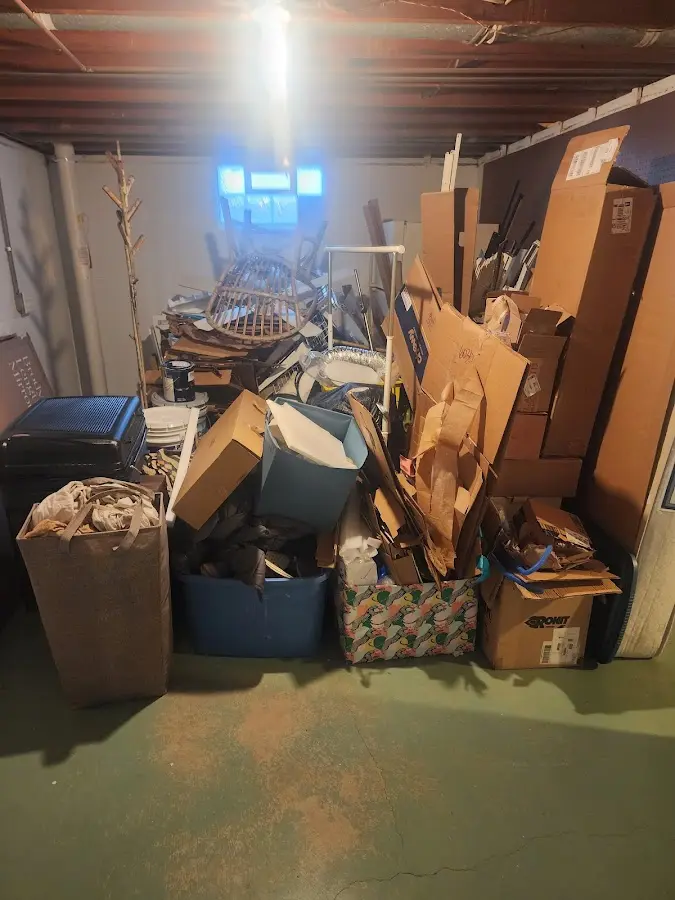 Roll-off dumpster container at job site for 6 Yard Dumpster Rental in Newington